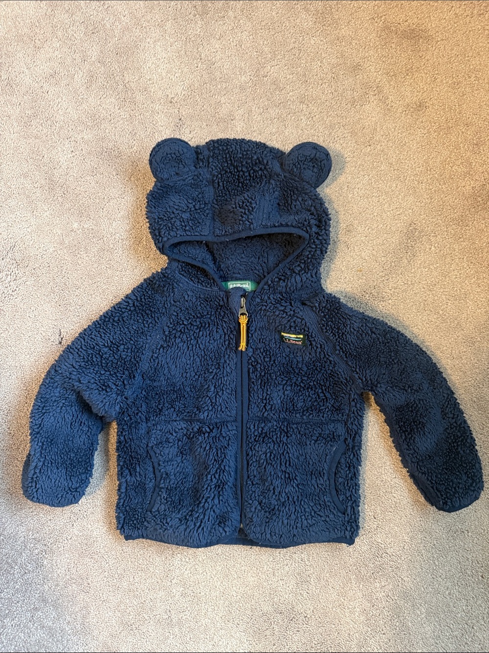 Kids jacket label - likely Puffer or Vest